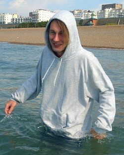 swimming in clothes at work on the beach